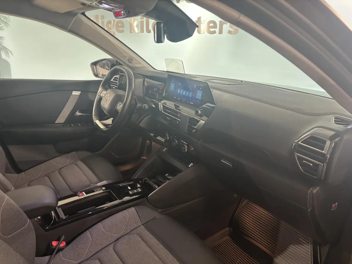 Feel 50 kWh | Cruise Control | Apple Carplay - Android Auto | Achteruitrijcamera | Head up Display