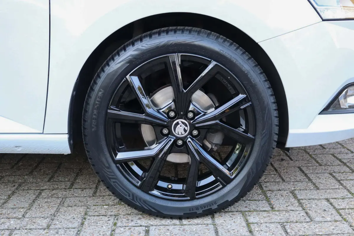 1.0 TSI 95pk Ambition | Volautomatische airconditioning | All season banden | Parkeersensoren achter
