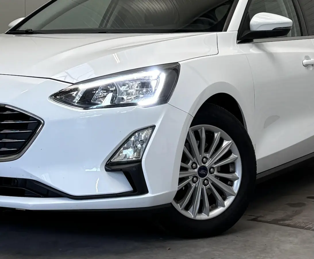 1.0 EcoB. Hybrid Titanium X Business / Virtual Dashboard / Trekhaak / Carplay / NL Auto / NAP / Keurige staat!
