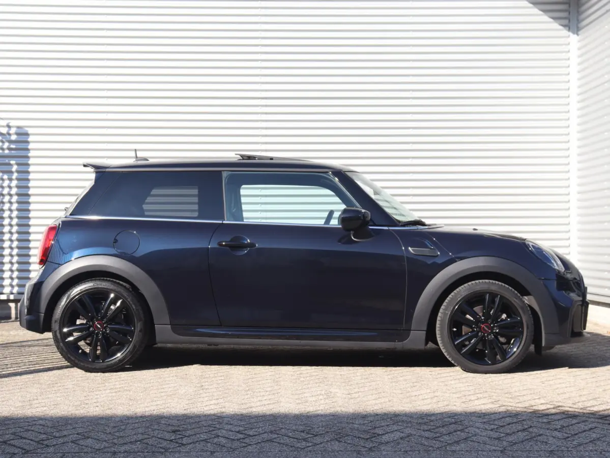 Cooper | Rockingham GT + John Cooper Works Pakket + Panodak + Sportstoelen + Apple Carplay + Adaptief Onderstel + Verwarmbare Voorstoelen + 18'' LMV
