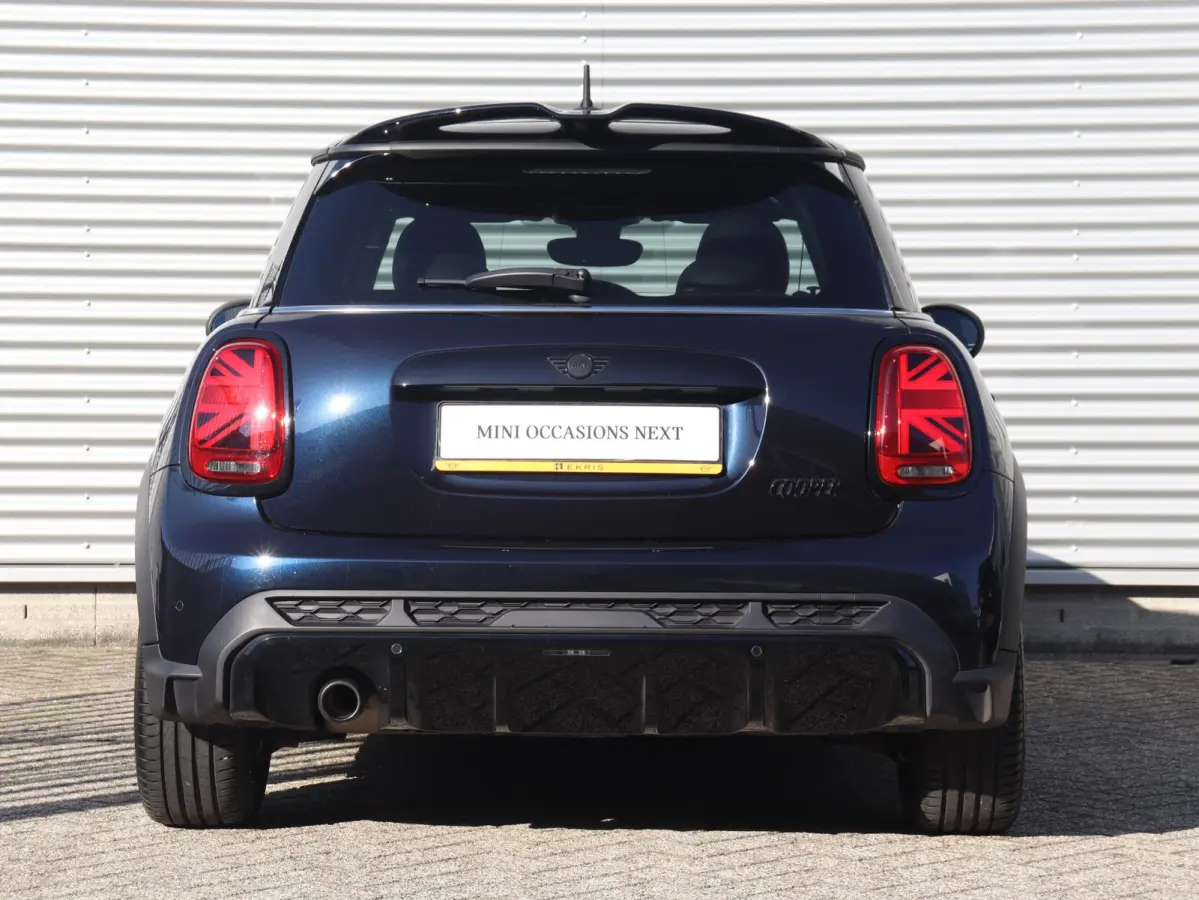 Cooper | Rockingham GT + John Cooper Works Pakket + Panodak + Sportstoelen + Apple Carplay + Adaptief Onderstel + Verwarmbare Voorstoelen + 18'' LMV