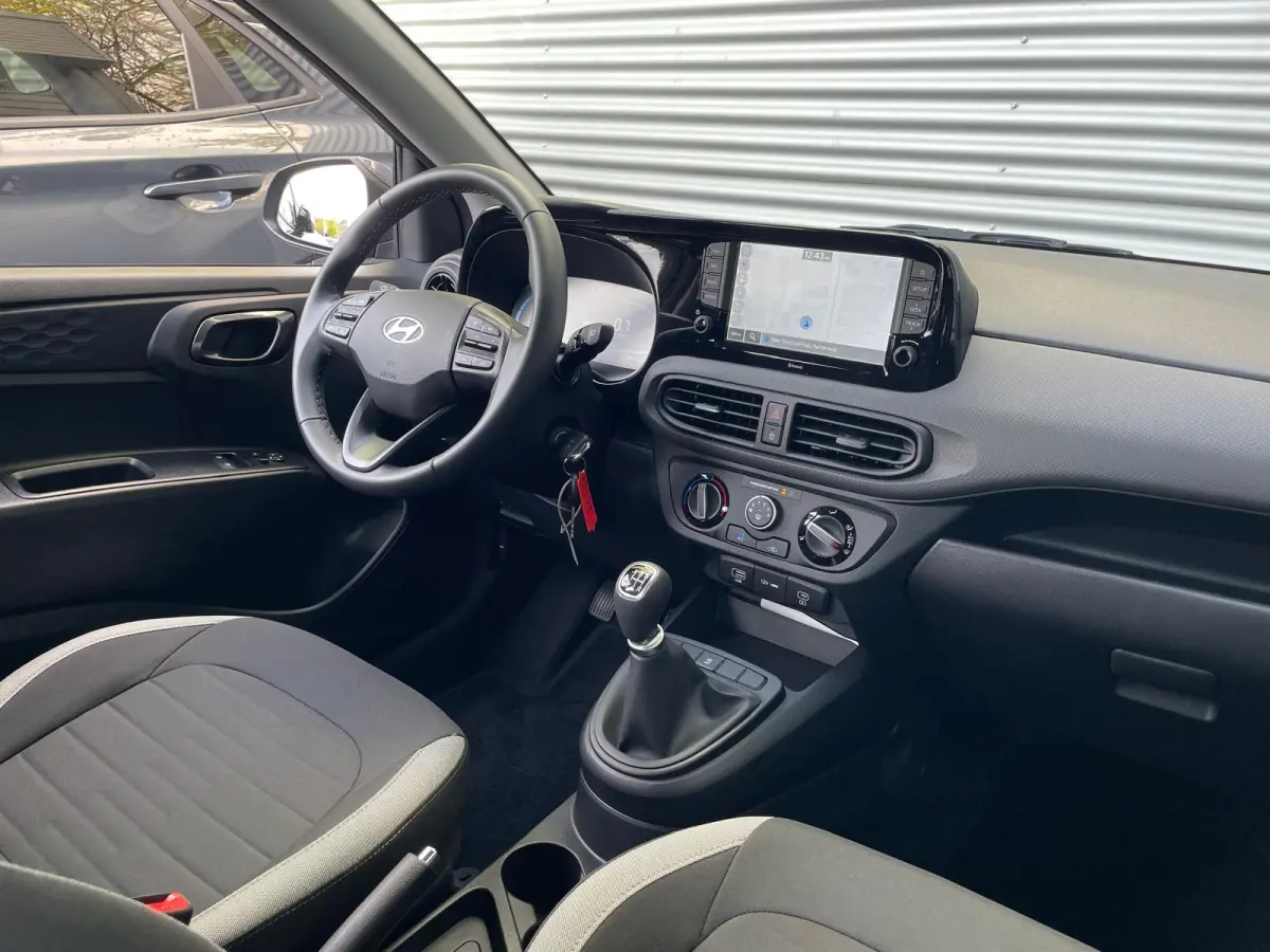 1.0 Comfort Smart | Navi | Airco | Carplay | Parkeercamera | Elek. inkl. spiegels | Cruise Control | Aut. verlichting