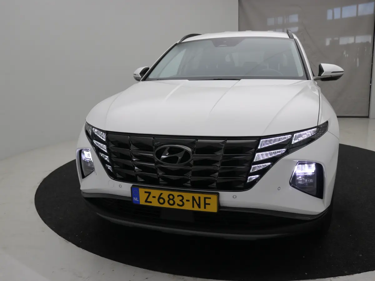 1.6 T-GDI PHEV Comfort Smart 4WD | Achteruitrijcamera | Airco (automatisch) | Apple Carplay/Android Auto|telefoonintegratie premium