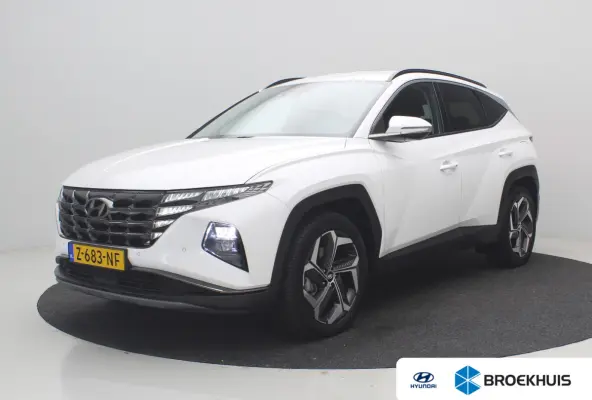 1.6 T-GDI PHEV Comfort Smart 4WD | Achteruitrijcamera | Airco (automatisch) | Apple Carplay/Android Auto|telefoonintegratie premium