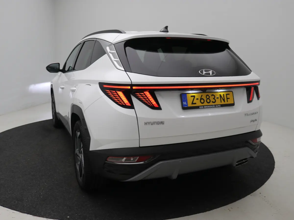 1.6 T-GDI PHEV Comfort Smart 4WD | Achteruitrijcamera | Airco (automatisch) | Apple Carplay/Android Auto|telefoonintegratie premium