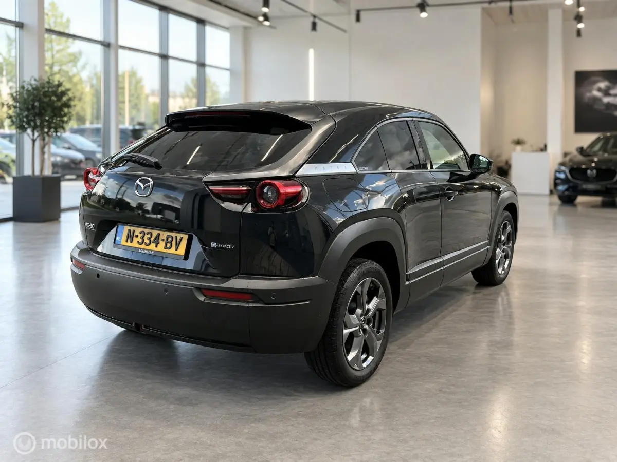 e-SkyActiv 145 36kWh | SOH 93,69% | HUD | Leder | Stoel- & Stuurverwarming