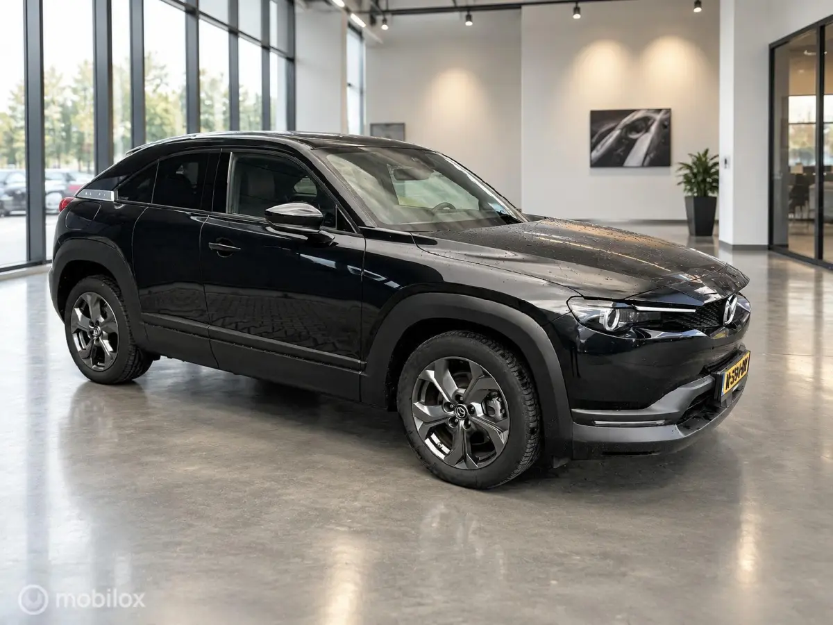 e-SkyActiv 145 36kWh | SOH 93,69% | HUD | Leder | Stoel- & Stuurverwarming
