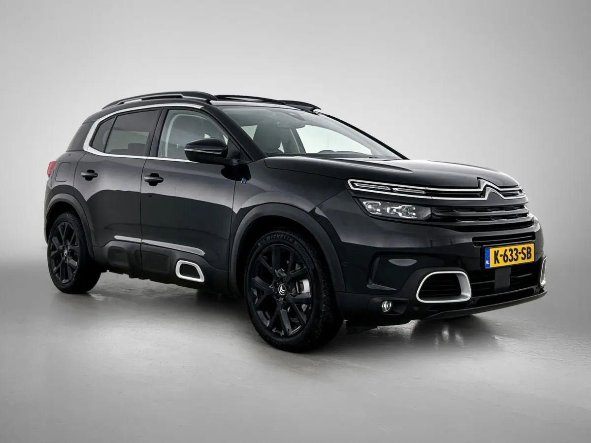 1.6 Plug-in Hybrid 225pk Business Plus Automaat | Schuif-/Kanteldak | Adaptieve Cruise Control | Elektrische Klep | Trekhaak | LED | Keyless Entry/Start |