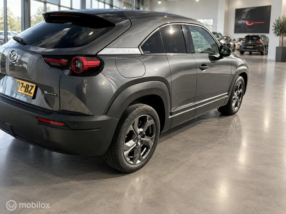 e-SkyActiv 145 36kWh | SOH 93,31% MOBA | HUD | Leder | Elektrisch pakket | 74.279 KM