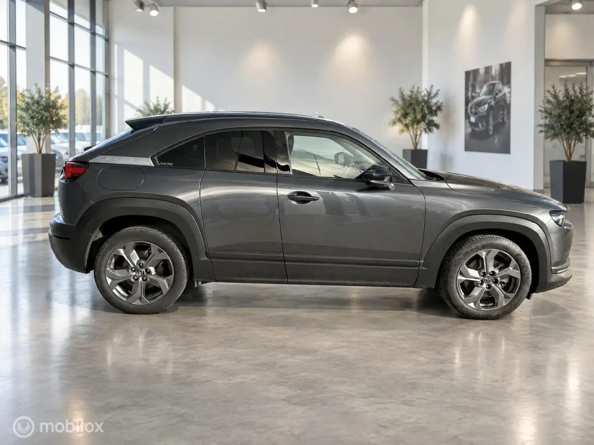 e-SkyActiv 145 36kWh | SOH 93,31% MOBA | HUD | Leder | Elektrisch pakket | 74.279 KM