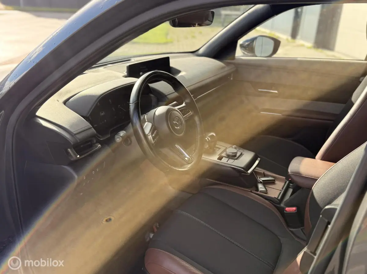 e-SkyActiv 145 36kWh | SOH 93,31% MOBA | HUD | Leder | Elektrisch pakket | 74.279 KM