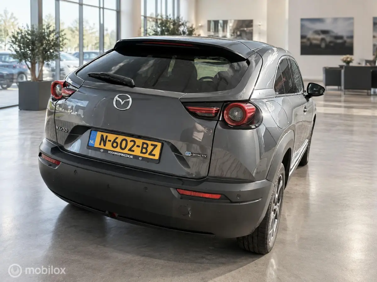 e-SkyActiv 145 36kWh | SOH 93,31% MOBA | HUD | Leder | Elektrisch pakket | 74.279 KM