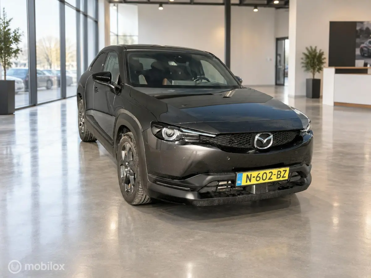 e-SkyActiv 145 36kWh | SOH 93,31% MOBA | HUD | Leder | Elektrisch pakket | 74.279 KM