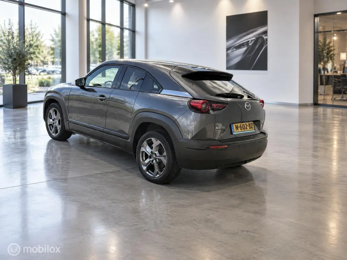 e-SkyActiv 145 36kWh | SOH 93,31% MOBA | HUD | Leder | Elektrisch pakket | 74.279 KM
