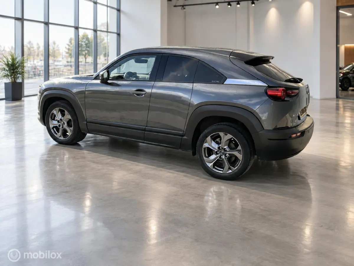 e-SkyActiv 145 36kWh | SOH 93,31% MOBA | HUD | Leder | Elektrisch pakket | 74.279 KM