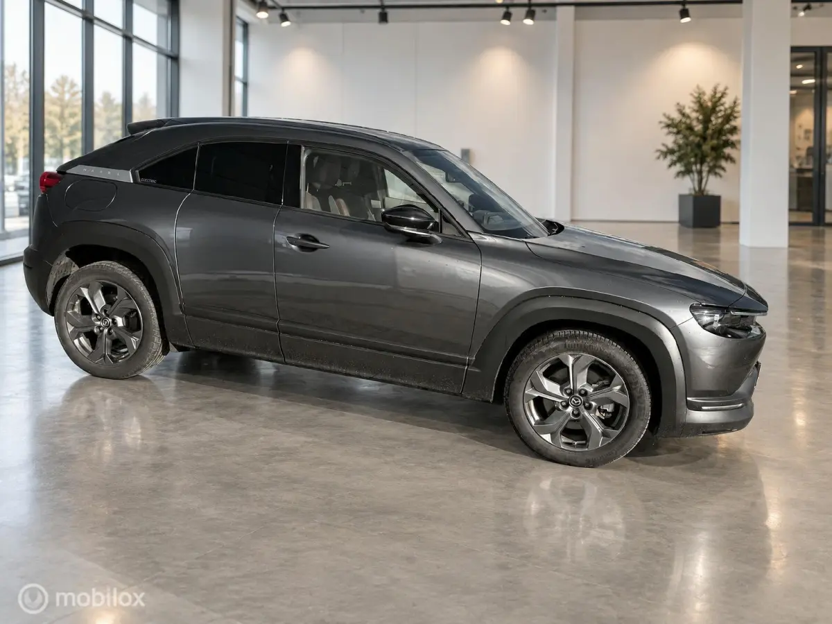 e-SkyActiv 145 36kWh | SOH 93,31% MOBA | HUD | Leder | Elektrisch pakket | 74.279 KM