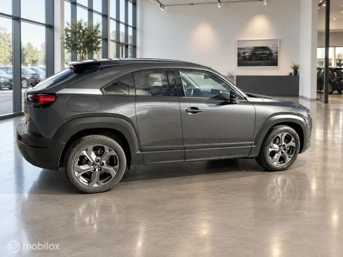 e-SkyActiv 145 36kWh | SOH 93,31% MOBA | HUD | Leder | Elektrisch pakket | 74.279 KM