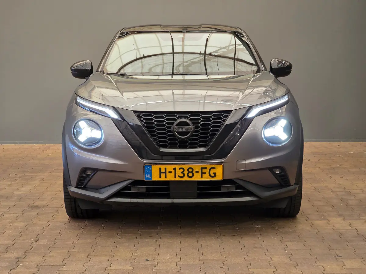 1.0 DIG-T Premiere Edition Stoelverwarming | Camera | Navigatie | 19" Lichtmetaal | Climate Control | Parkeersensoren Rondom | Keyless | Achteruitrijcamera | Afwijkende dakkleur | Airco (aut