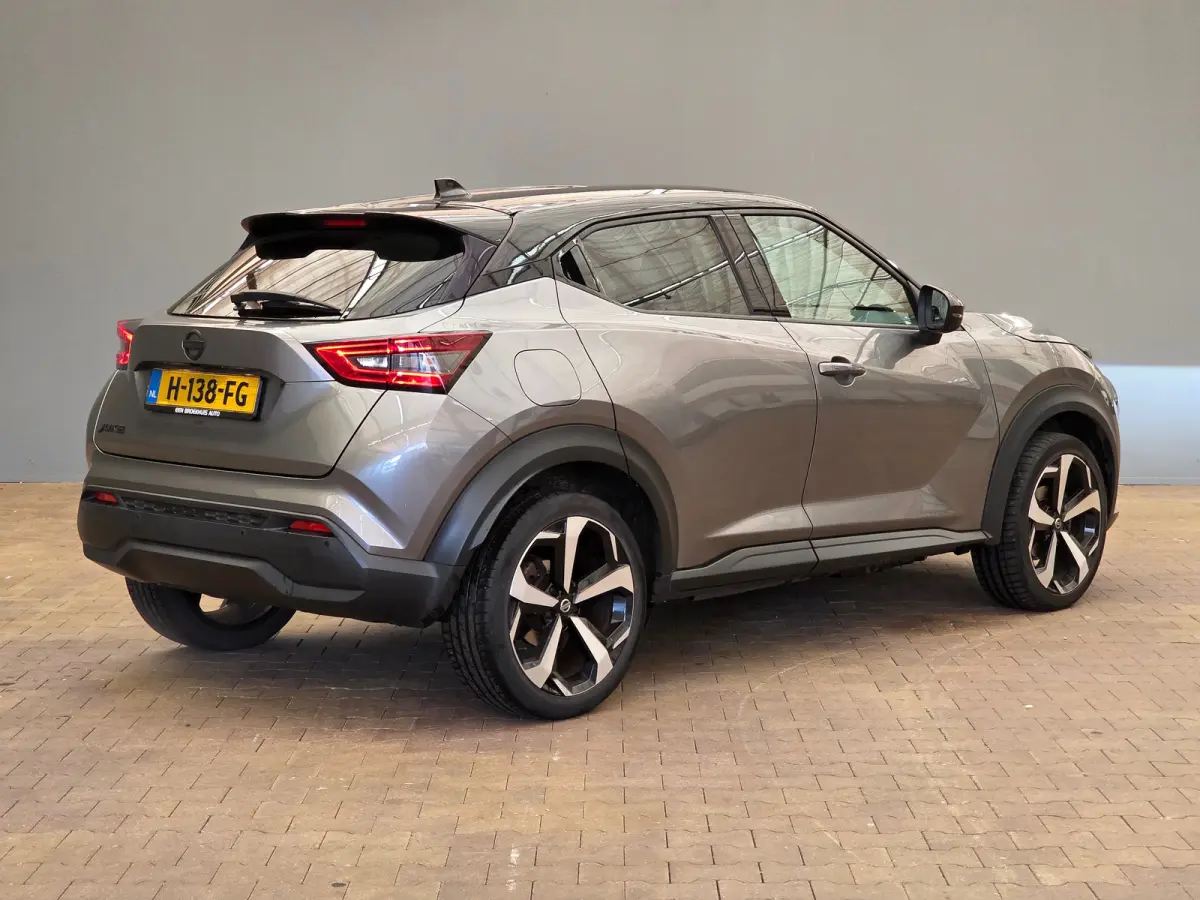 1.0 DIG-T Premiere Edition Stoelverwarming | Camera | Navigatie | 19" Lichtmetaal | Climate Control | Parkeersensoren Rondom | Keyless | Achteruitrijcamera | Afwijkende dakkleur | Airco (aut