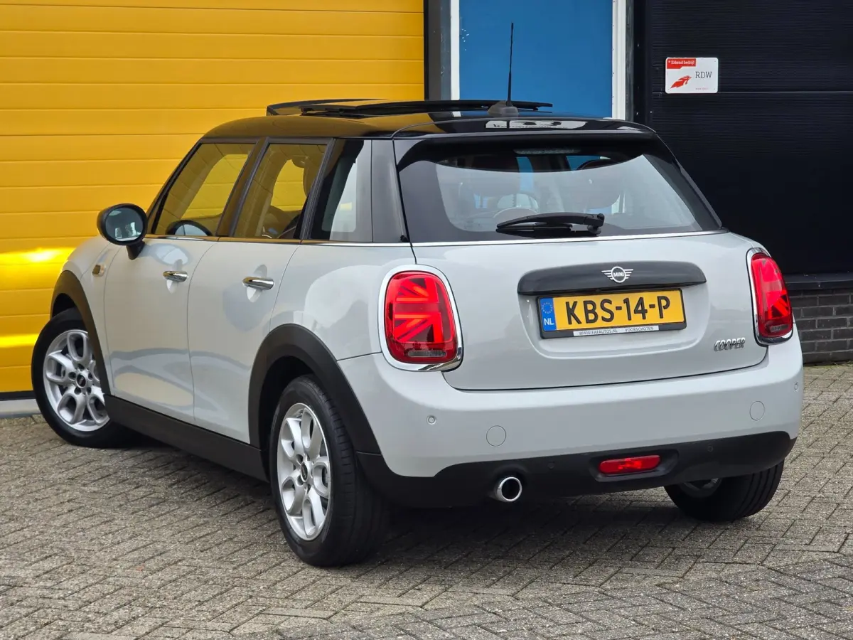 1.5 Cooper Business Edition / AUT / Cruise Control / Cognac Leder / Navi / Open Panoramadak / Led / Allu Velgen