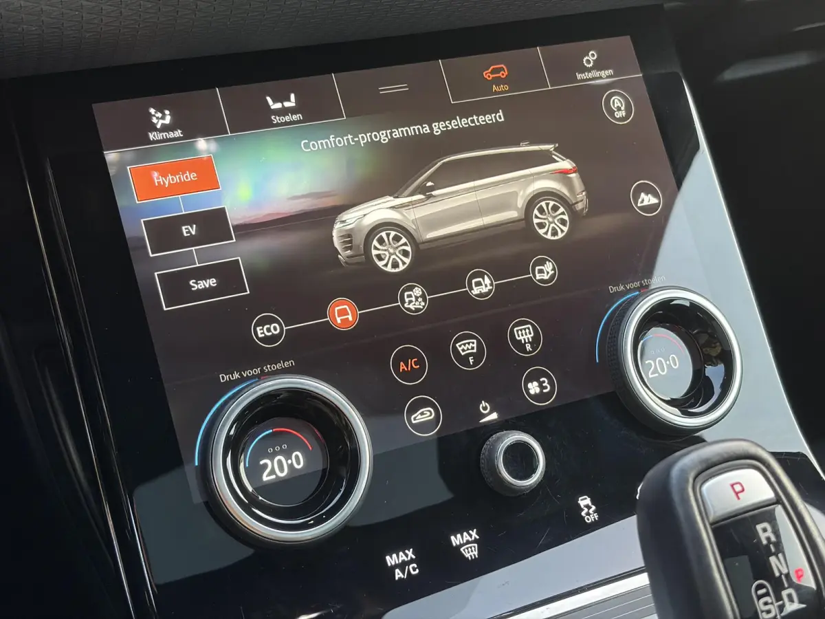 1.5 P300e AWD R-Dynamic HSE ✓2e Eigenaar✓Carplay✓Camera✓Navi✓Pano✓Leder✓Stoelverw-Stuurverw✓Clima✓Cruise✓Pdc V+A✓309pk✓Lm velgen✓Bj 11-2020✓N.A.P✓Nieuwe Apk bij