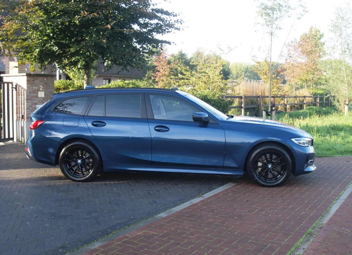 330e eDrive Touring 292 PK | plug-in Hybride | Leder interieur | Panoramadak | Camera | Apple Carplay |