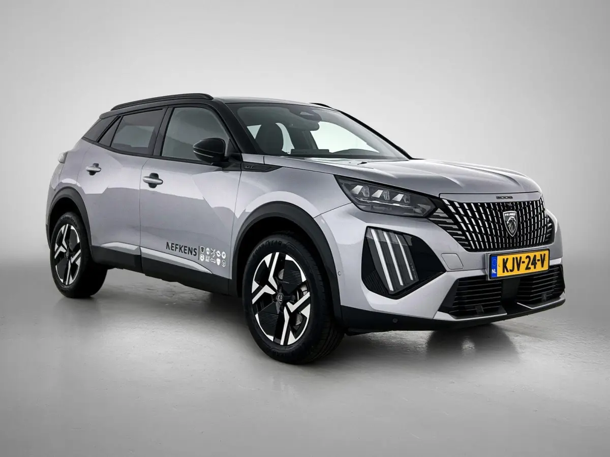 1.2 Hybrid 145 GT | Elektrische Bestuurderstoel | Verwarmbare Voorstoelen | Navigatie | Dode Hoek Bewaking | Camera Voor + Achter | Adaptieve Cruise Control |