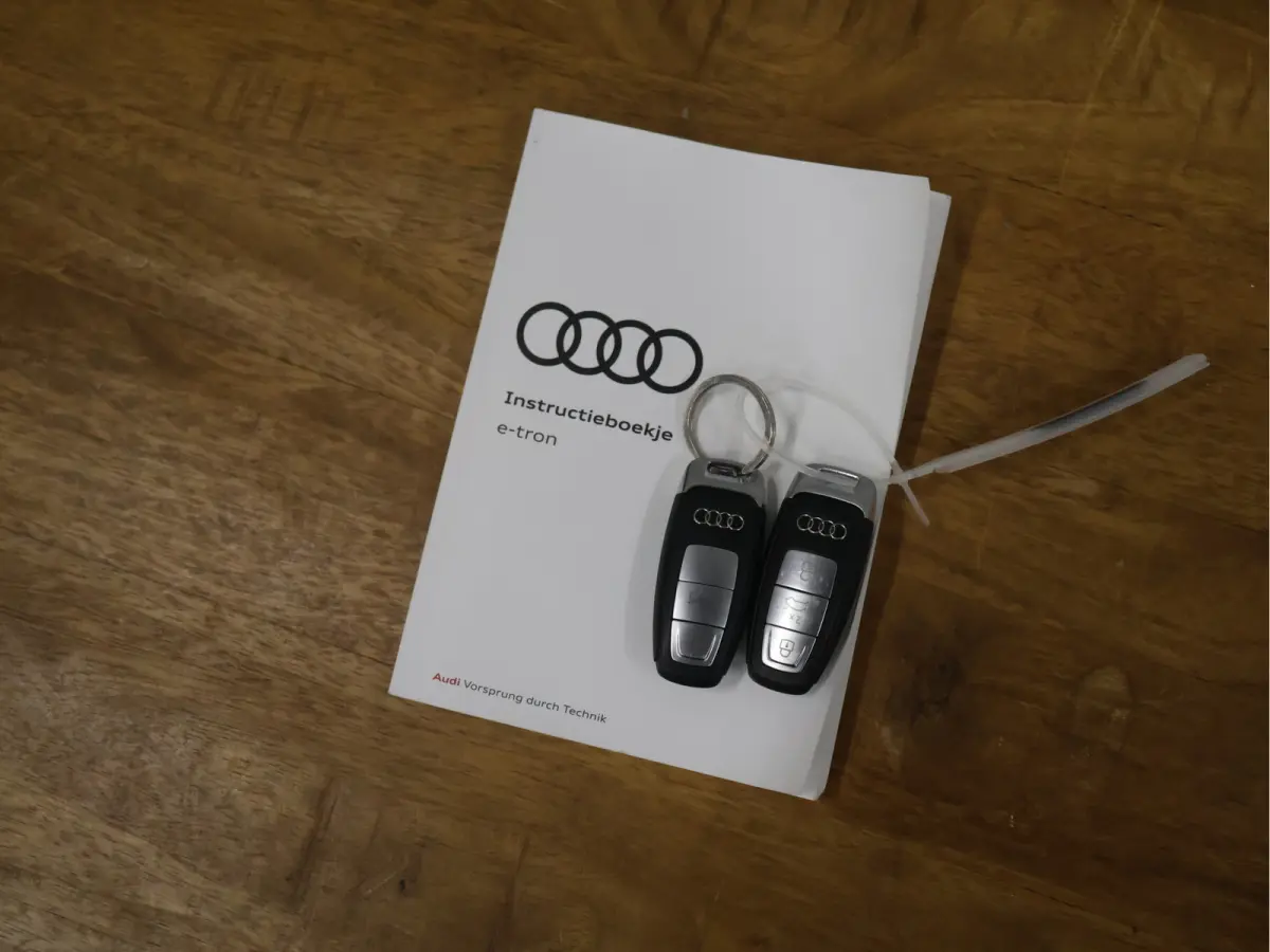 55 quattro Business edition Plus 95 kWh [SCHUIFKANTELDAK, APPLE CARPLAY, ANDROID,  ADAPTIVE CRUISE CONTROL, STOELVERWARMING, MEMORY SEATS, DIGITAL DASH, PDC V+A, LEDER, ELEKTRISCHE ACHTERKLE