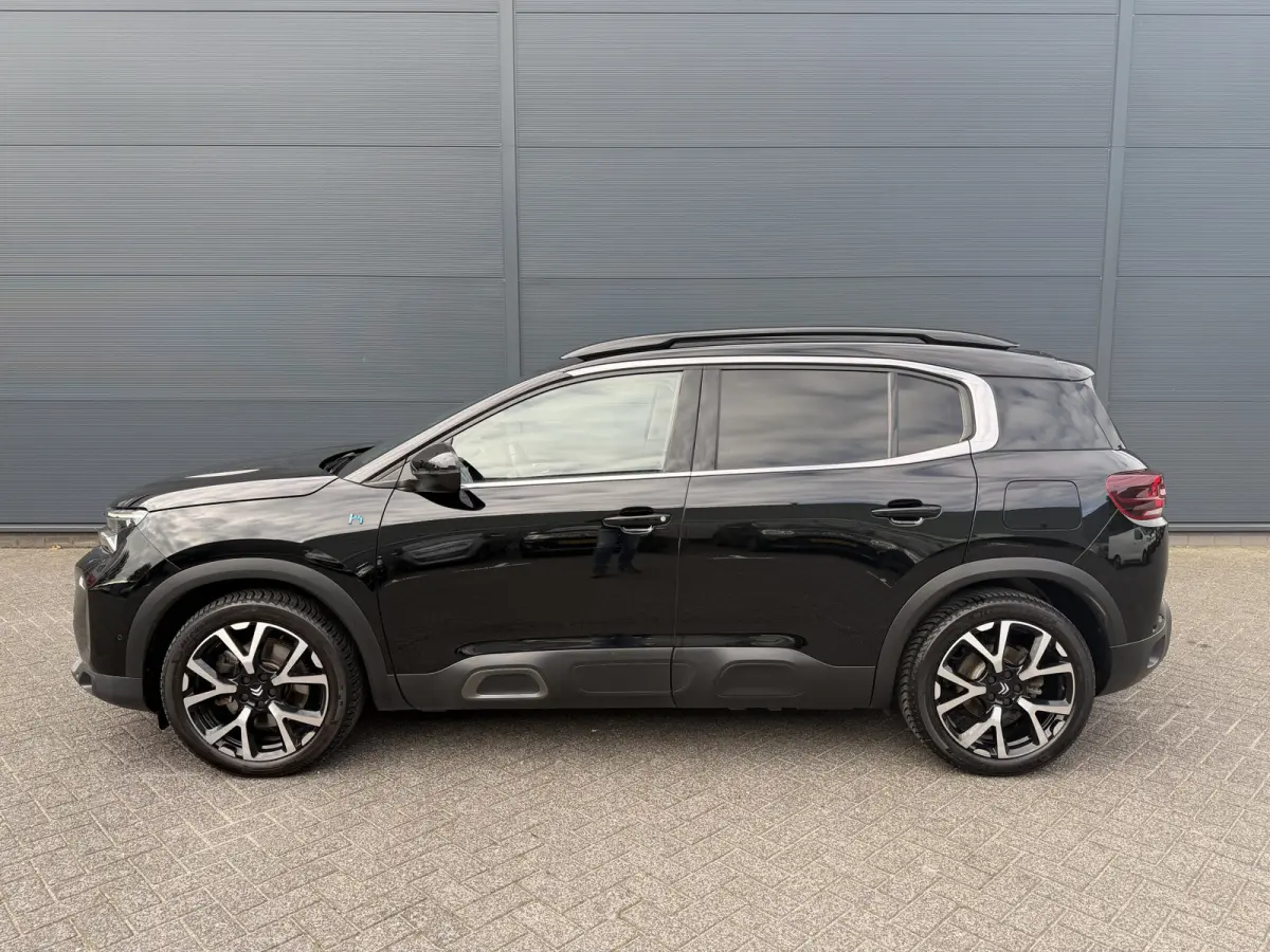 225pk Plug-in Hybrid Shine (Elektrisch Schuifdak - Trekhaak - Leder incl verwarming/massage/geheugen - Elektrische Klep - 360gr Camera - Adaptieve Cruise Controle)