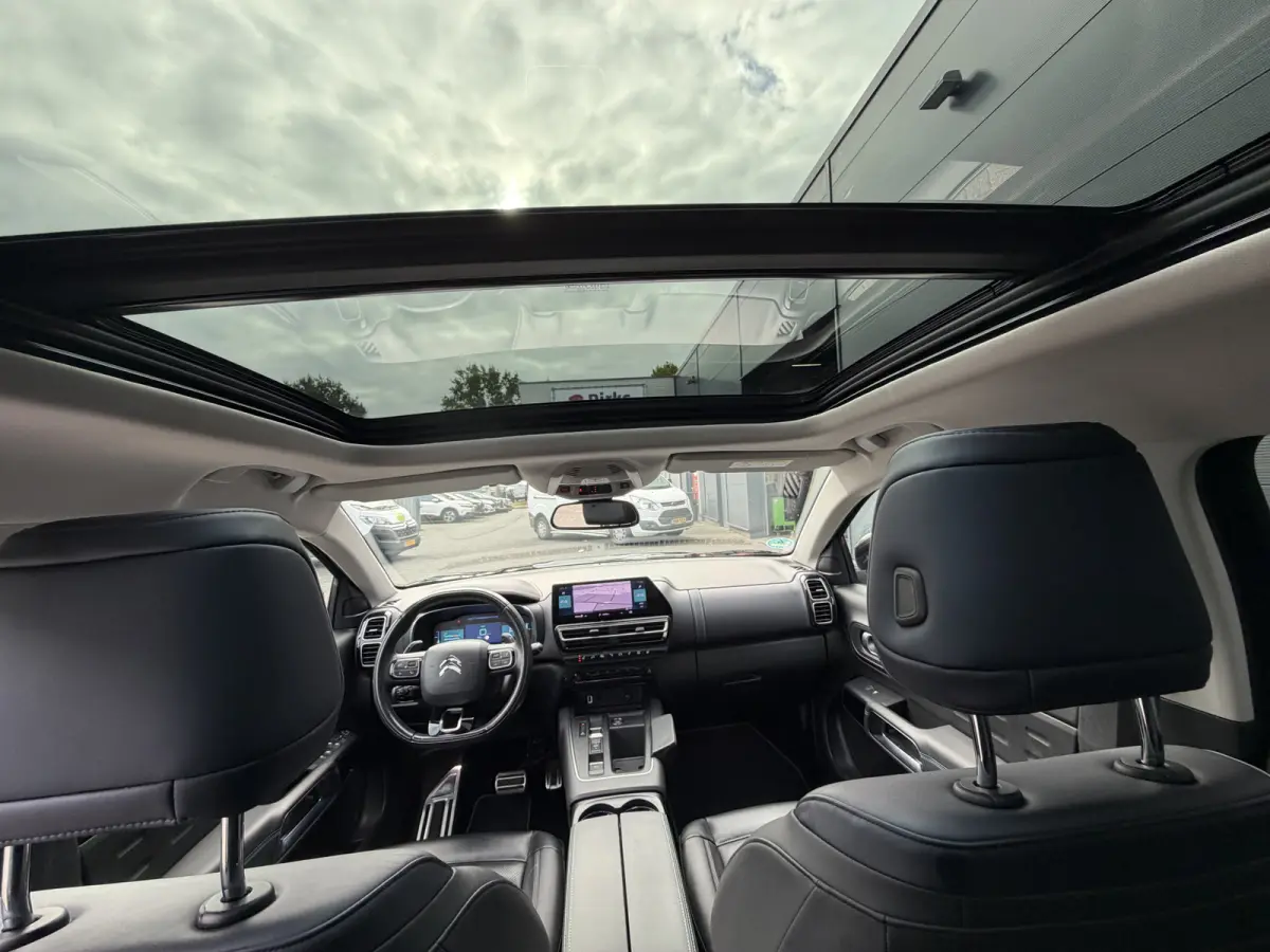 225pk Plug-in Hybrid Shine (Elektrisch Schuifdak - Trekhaak - Leder incl verwarming/massage/geheugen - Elektrische Klep - 360gr Camera - Adaptieve Cruise Controle)