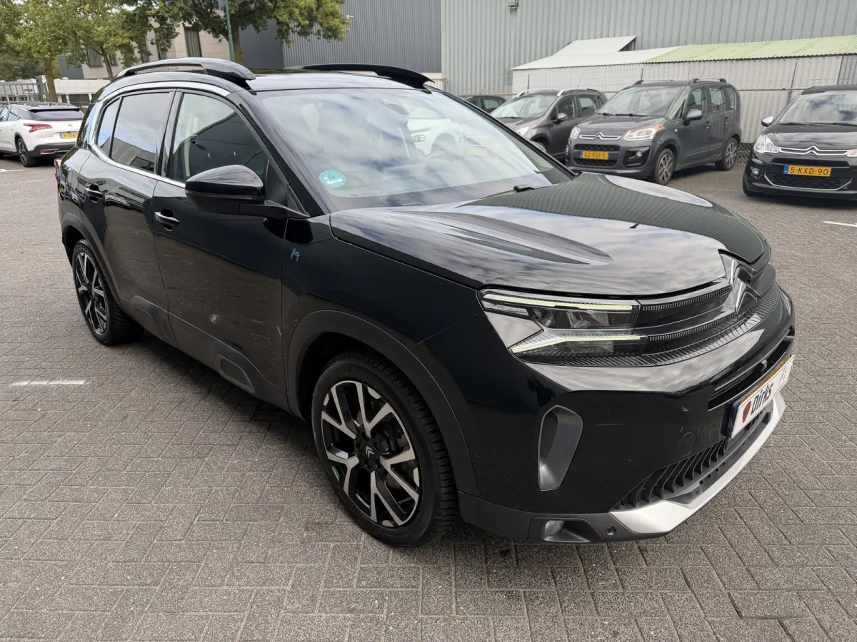 225pk Plug-in Hybrid Shine (Elektrisch Schuifdak - Trekhaak - Leder incl verwarming/massage/geheugen - Elektrische Klep - 360gr Camera - Adaptieve Cruise Controle)