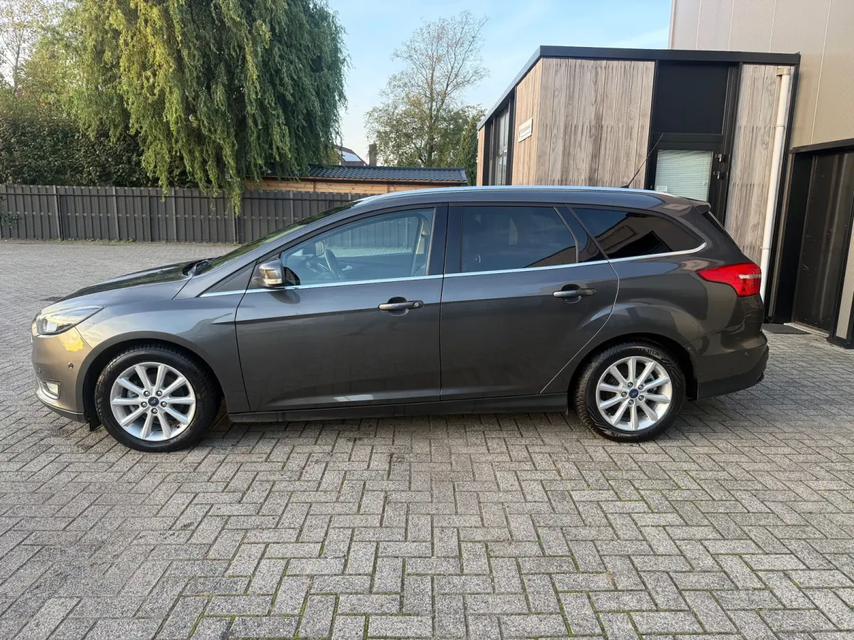 1.0 Titanium 1E EIG|NAVI|PDC|STUUR/STOEL VW/|CRUISE CONTROL|DEALER ONDERHOUDEN|