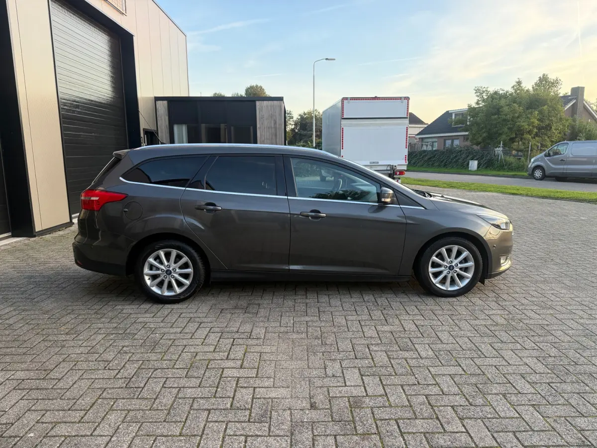 1.0 Titanium 1E EIG|NAVI|PDC|STUUR/STOEL VW/|CRUISE CONTROL|DEALER ONDERHOUDEN|