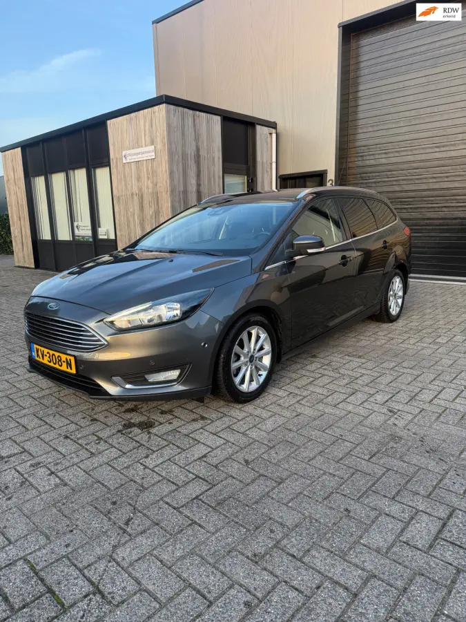 1.0 Titanium 1E EIG|NAVI|PDC|STUUR/STOEL VW/|CRUISE CONTROL|DEALER ONDERHOUDEN|