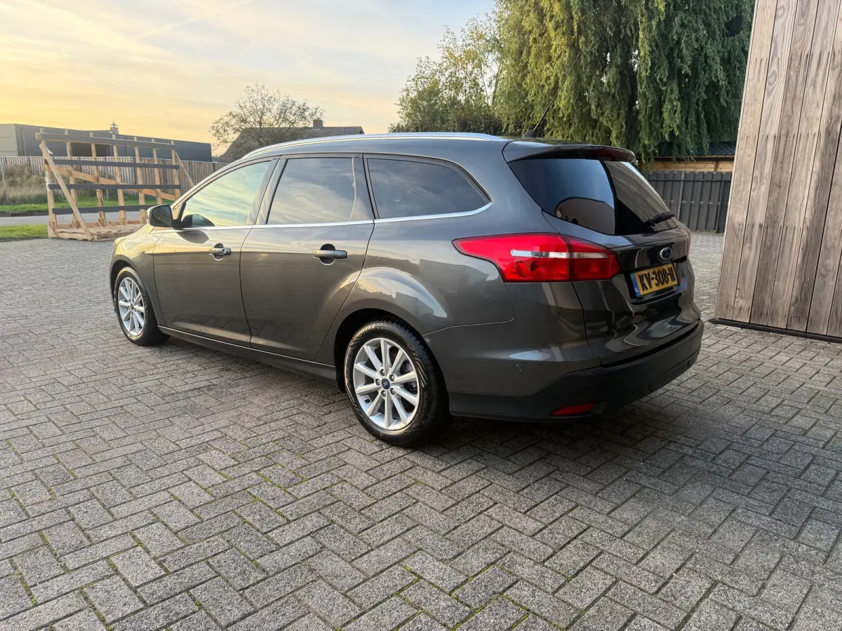1.0 Titanium 1E EIG|NAVI|PDC|STUUR/STOEL VW/|CRUISE CONTROL|DEALER ONDERHOUDEN|