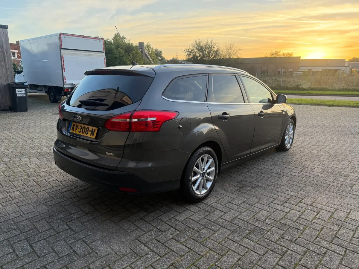 1.0 Titanium 1E EIG|NAVI|PDC|STUUR/STOEL VW/|CRUISE CONTROL|DEALER ONDERHOUDEN|