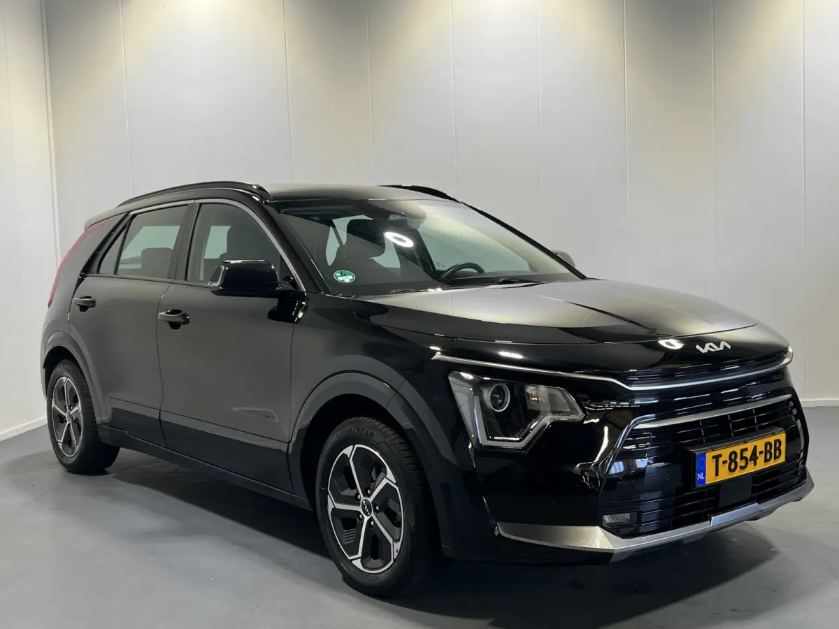 1.6 GDi Hybrid DynamicLine | Achteruitrijcamera | Cruise Control | 1/2 lederen bekleding |