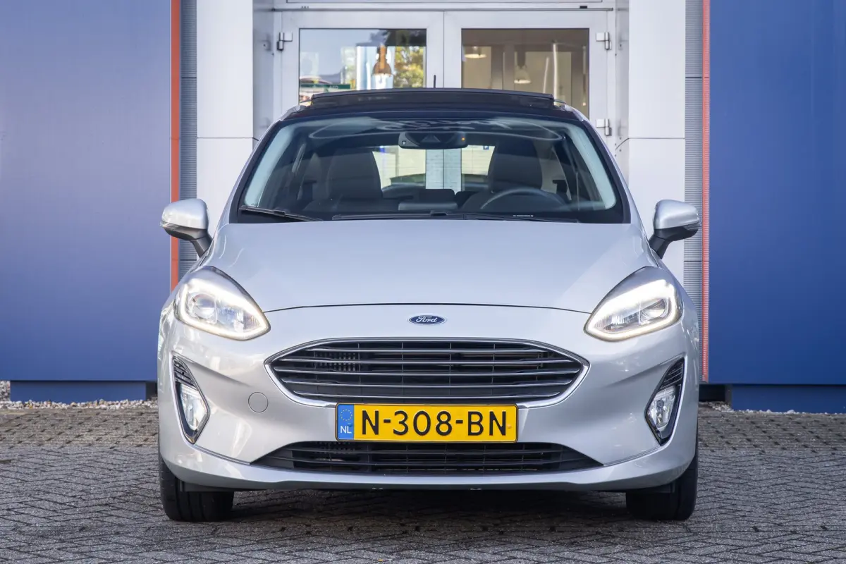 1.0 EcoBoost Titanium | Panoramadak | Apple Carplay/Android Auto | Cruise control | Navigatie | Parkeersensoren | Airco (automatisch) | Apple Carplay/Android Auto|telefoonintegratie premium 