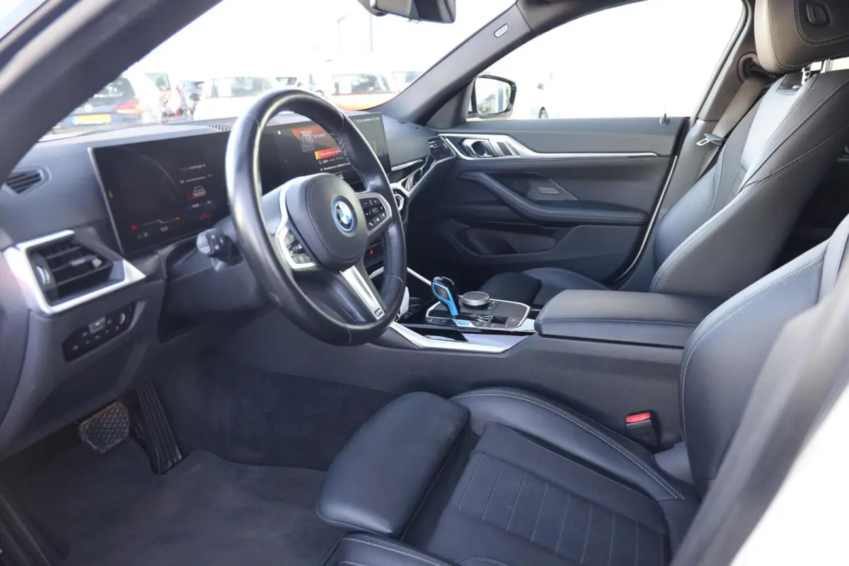 eDrive40 High Executive 84 kWh|SOH 94.5%|Schuifdak|Camera|Laser|
