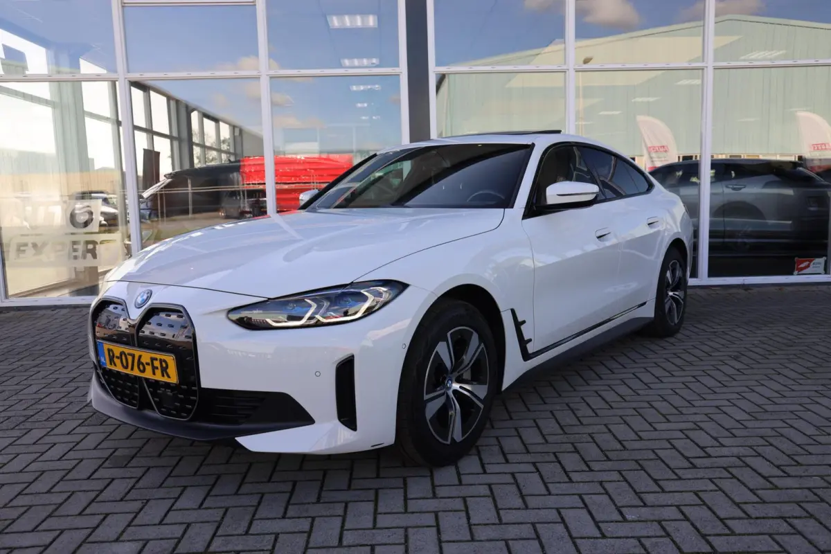 eDrive40 High Executive 84 kWh|SOH 94.5%|Schuifdak|Camera|Laser|