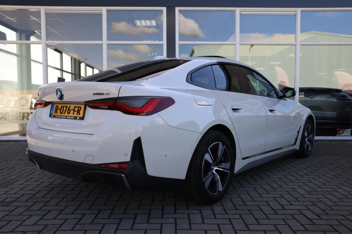 eDrive40 High Executive 84 kWh|SOH 94.5%|Schuifdak|Camera|Laser|
