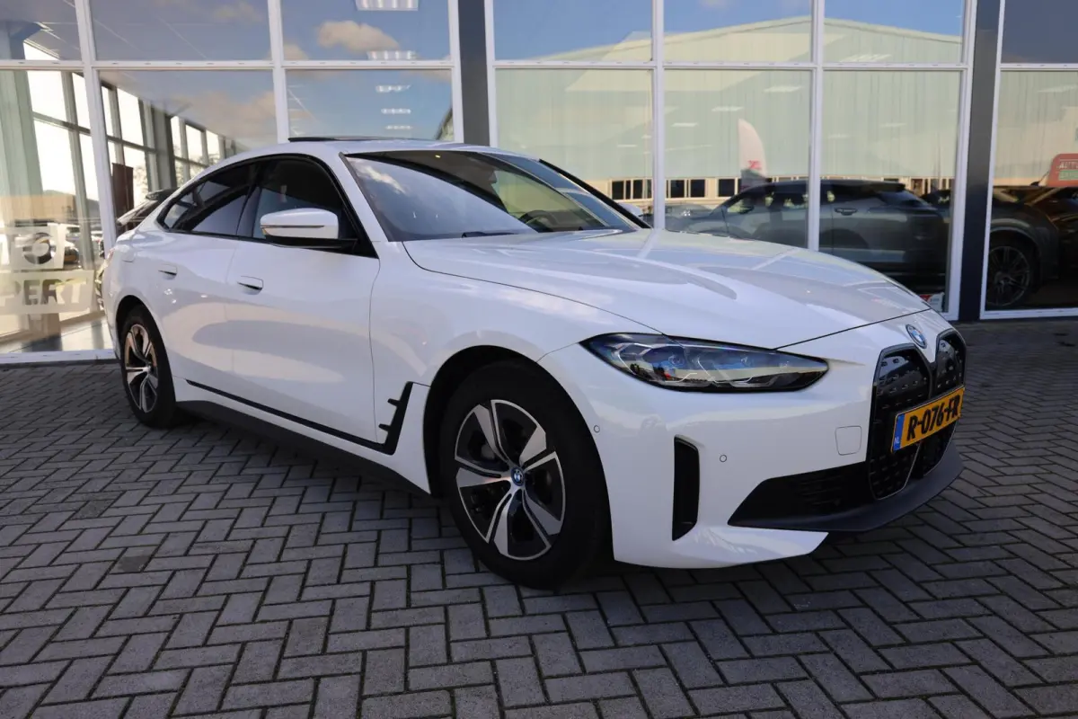 eDrive40 High Executive 84 kWh|SOH 94.5%|Schuifdak|Camera|Laser|