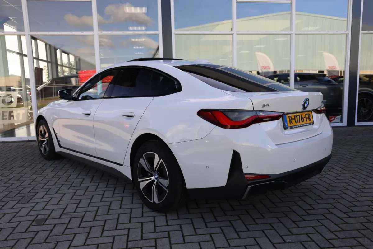 eDrive40 High Executive 84 kWh|SOH 94.5%|Schuifdak|Camera|Laser|