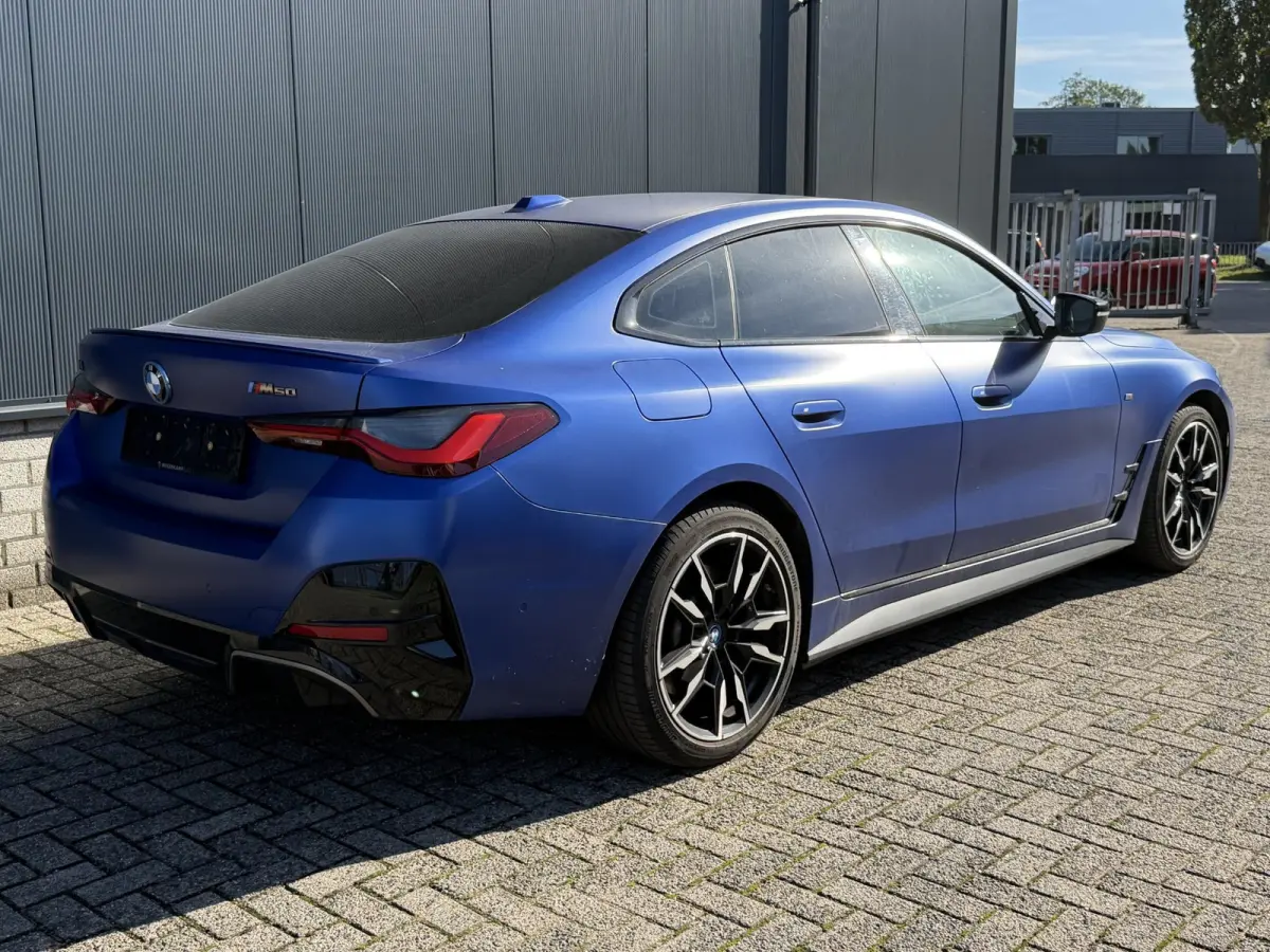 M50 High Executive 84 kWh 19"/Lederen M-stoelen + memory/Harman Kardon/Keyless/Camera/Adaptief M onderstel/Stoelverwarming