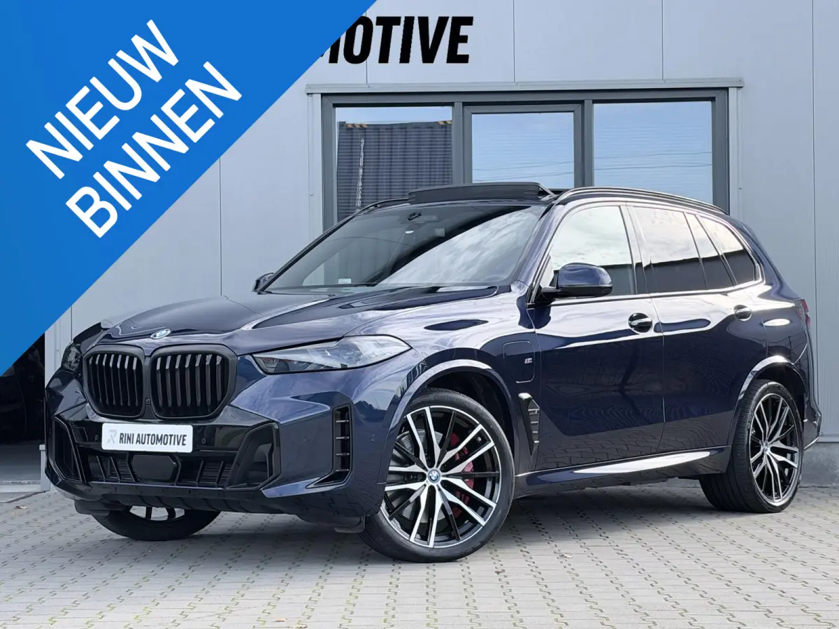 xDrive50e M sport Pro | 490 PK | Trekhaak | Pano | M Stoelen | Individual Tansanitblau metallic | Long Range