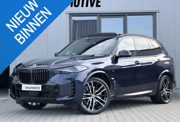 xDrive50e M sport Pro | 490 PK | Trekhaak | Pano | M Stoelen | Individual Tansanitblau metallic | Long Range