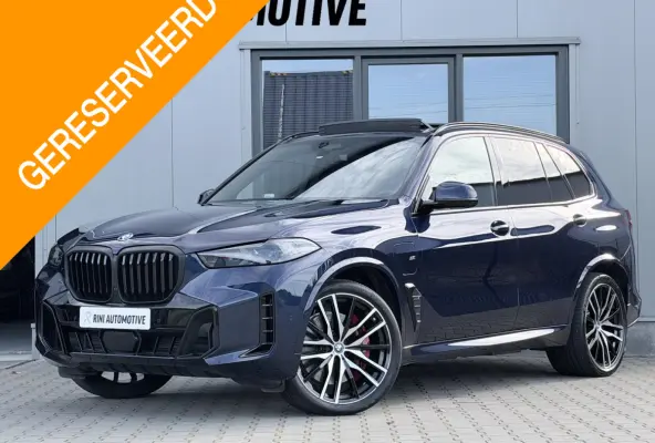 xDrive50e M sport Pro | 490 PK | Trekhaak | Pano | M Stoelen | Individual Tansanitblau metallic | Long Range