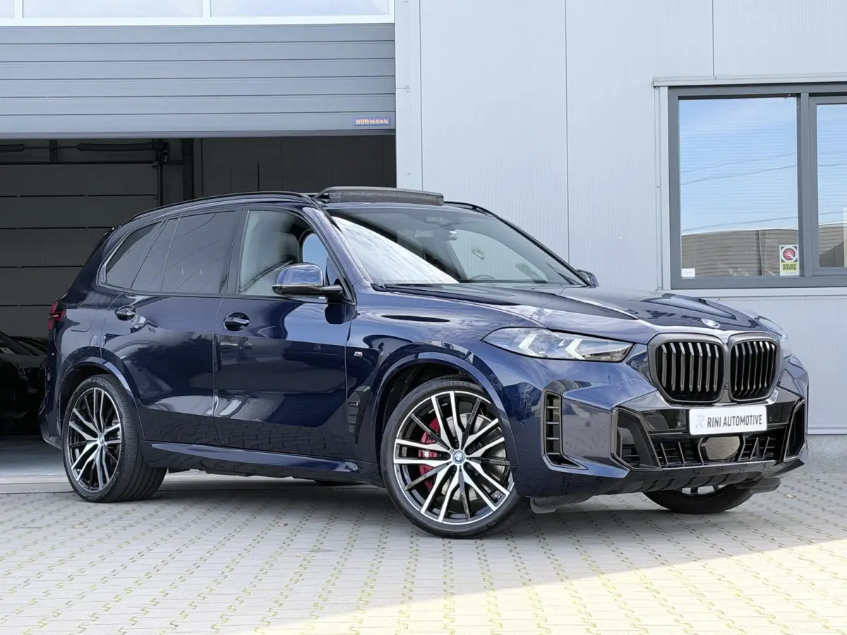 xDrive50e M sport Pro | 490 PK | Trekhaak | Pano | M Stoelen | Individual Tansanitblau metallic | Long Range