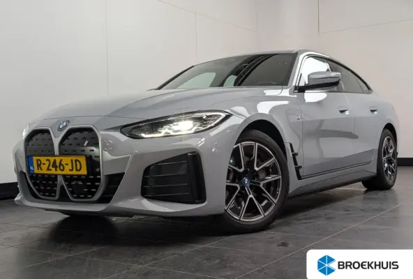 eDrive40 84 kWh M-Sport | SOH 94% | Sfeerverlichting | LED | Sportstoelen | Camera | Elk. Achterklep | Leder/Alcantara | Keyless | Clima | Navi | LMV | Parkeersensoren V+A