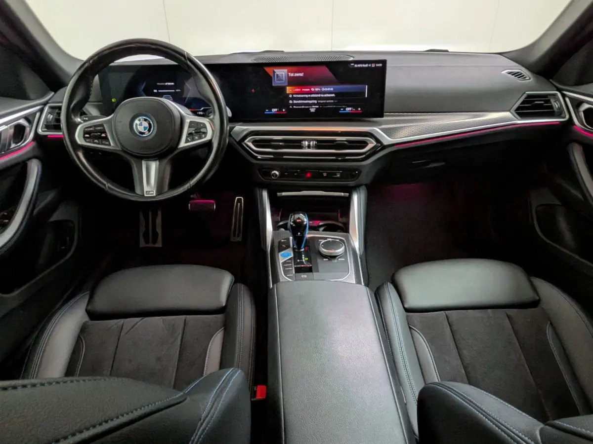 eDrive40 84 kWh M-Sport | SOH 94% | Sfeerverlichting | LED | Sportstoelen | Camera | Elk. Achterklep | Leder/Alcantara | Keyless | Clima | Navi | LMV | Parkeersensoren V+A